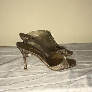 Manolo Blahnik heels with travel bag